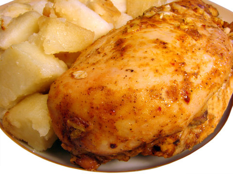 Roast chicken with spices and fried potatoes