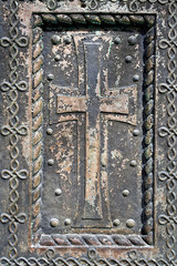 Cross on the old church door