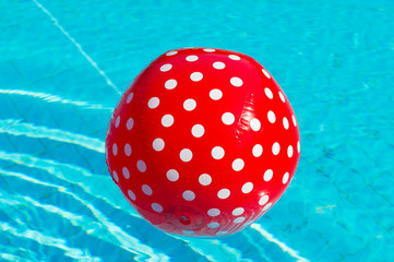 Red ball with white spots