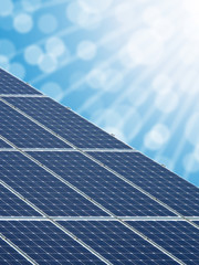 Solar energy panels with blurred background.