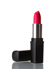 Fototapeta premium Red lipstick isolated on white background