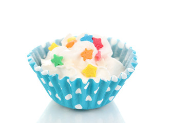 Creamy cupcake isolated on white