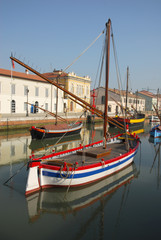 Fototapeta na wymiar Cesenatico port, zabytkowe rybackie łodzie żaglowe