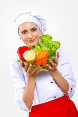 Portrait of a young cook in uniform