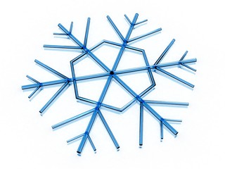 Icy snowflake on white background