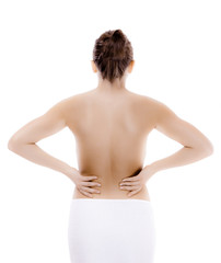 Naklejka premium Woman massaging pain back isolated on white background