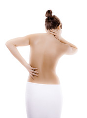 Naklejka premium Woman massaging pain back isolated on white background