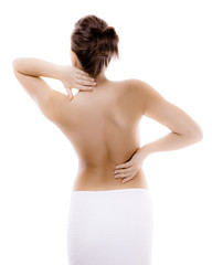 Naklejka premium Woman massaging pain back isolated on white background
