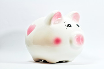 a piggy saving box on white background