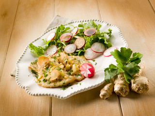 cutlet with ginger green salad and radish