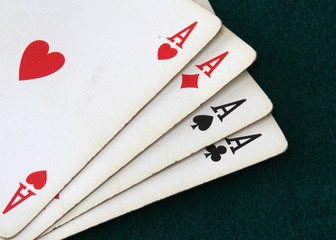 Poker aces green background casinò