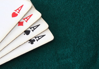 Poker aces green background casinò