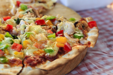 Seafood Pizza on the table.