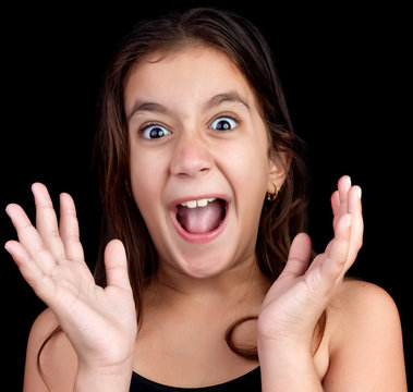 Girl screaming loudly on a black background