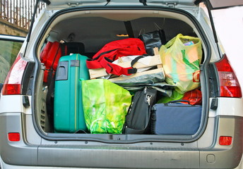 car trunk filled with luggage ready to leave for the winter holi