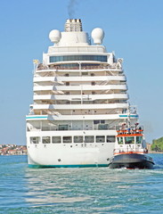 huge cruise ship sets sail from the port of Venice