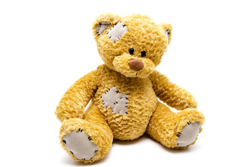 Plüschbär mit Wunde