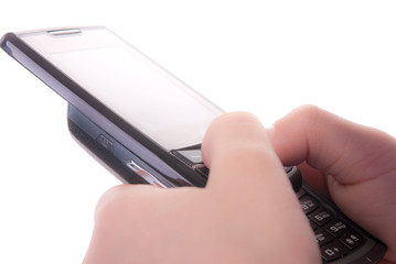 A mobile telephone is in child's hands