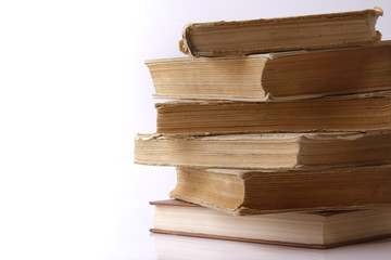 Fototapeta premium A pile of books isolated on white background
