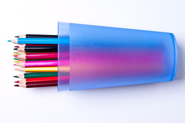 colored pencils on a light background