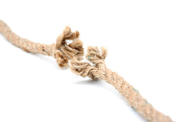 Close up of a damaged rope on white background