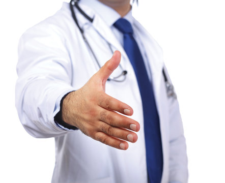 A male doctor giving his hand for a handshake