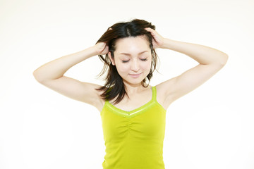 Fototapeta premium 頭痛に悩む女性