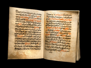 Koran on a black background