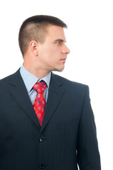 Serious attractive young businessman from profile
