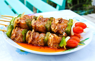 Raw barbecue spits ready for the grill.