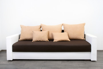 modern couch at white wall