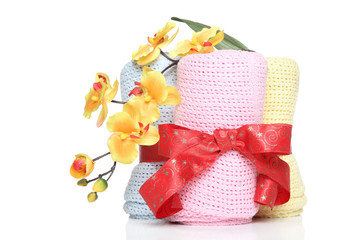 Baby towels tied with red ribbon