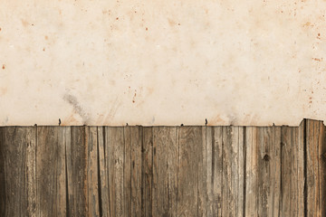 Aged paper on a wooden background