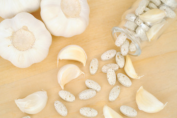 Garlic and herbal supplement pills, alternative medicine