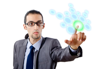 Businessman pressing virtual buttons