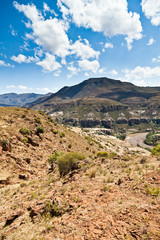 Rocky mountain landscape with dry riverbed