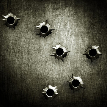metal with bullet hole