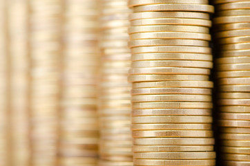 Golden coins in high stacks