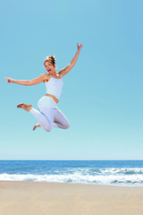 young beautiful woman jumping