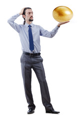 Fototapeta premium Man and golden egg isolated on white