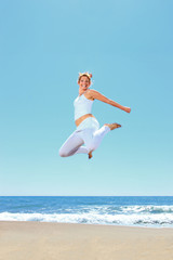 young beautiful woman jumping