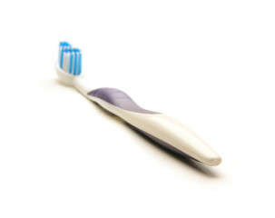 A lonely toothbrush isolated on a white background