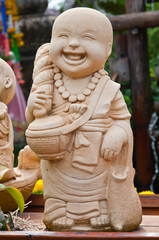 Little Buddhist monk statue