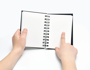Two hands holding book note