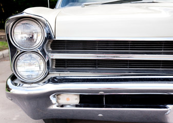 Classic old car close-up front left view