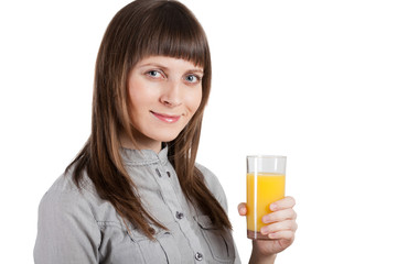 woman drinks an orange juice. Isolated on white