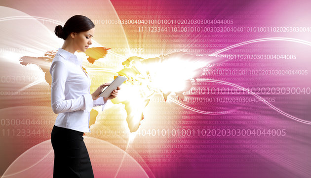 Woman in business wear with technology background