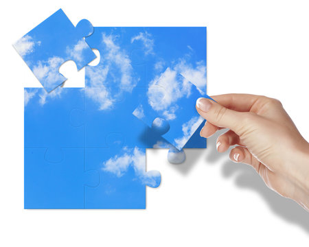 Puzzle with blue sky and white clouds