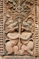 Sandstone carvings on wall in Prasat Khao Panom Rung, Buriram