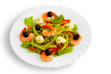Fresh Shrimp salad with olives and cream on a white background